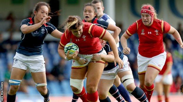 Wales vs Hong Kong. Wales Shona Powell-Hughes and Lee Ka Shun of Hong Kong