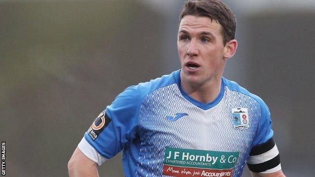 John Rooney in action for Barrow