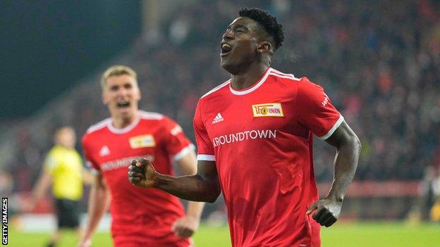 Taiwo Awoniyi celebrates a goal while playing for Union Berlin