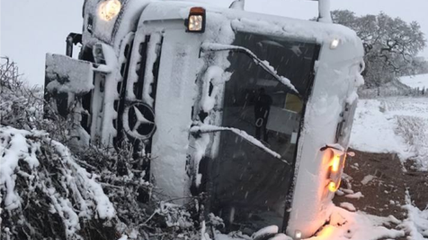 Overturned gritter