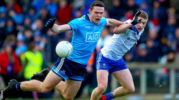 Monaghan's Colin Walshe challenges Dublin's Brian Fenton in the game in late January