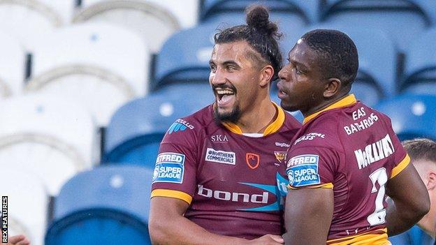 Jermaine McGillvary's (right) four-try haul helped Huddersfield to their first Super League win since beating bottom side Leigh 44-6 on 23 May