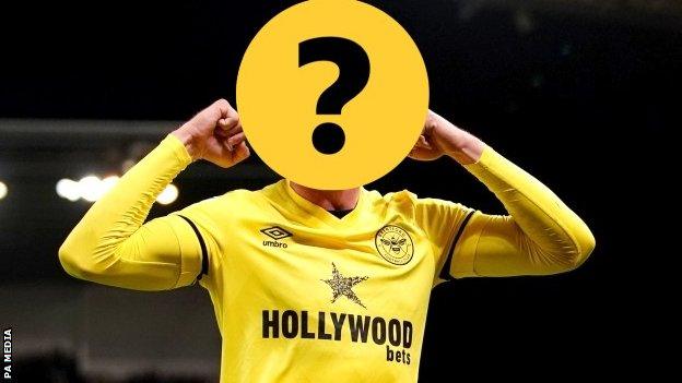 A Brentford player with a question mark hiding his face
