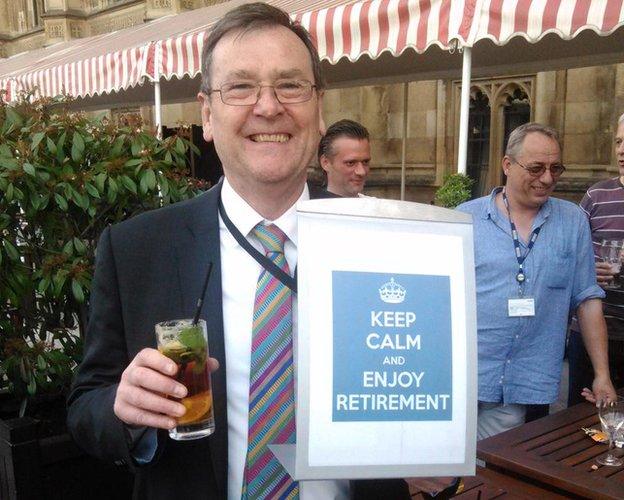 John Hess with a framed picture