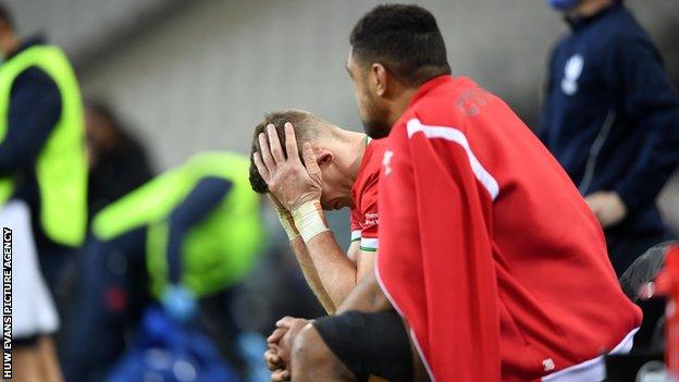 Liam Williams and Taulupe Faletau watching the final moments of Wales' 32-30 Six Nations defeat against France in Paris after the pair had been yellow-carded