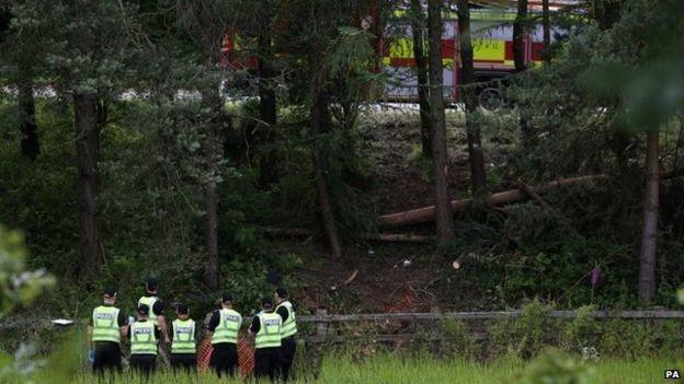 Police at the scene of the M9 crash