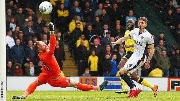 Hope Akpan scores Burton's opening goal against Burton