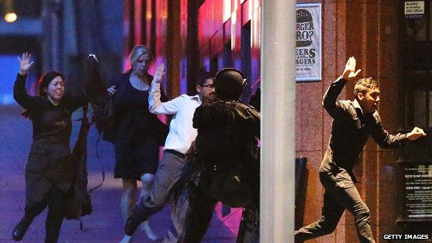 Hostages escape during Sydney cafe siege