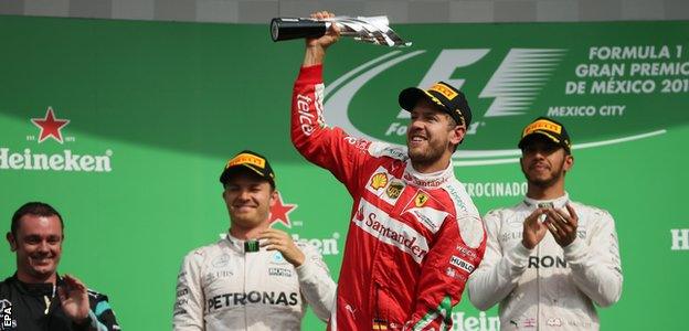 Sebastian Vettel celebrates third place in Mexico before being demoted