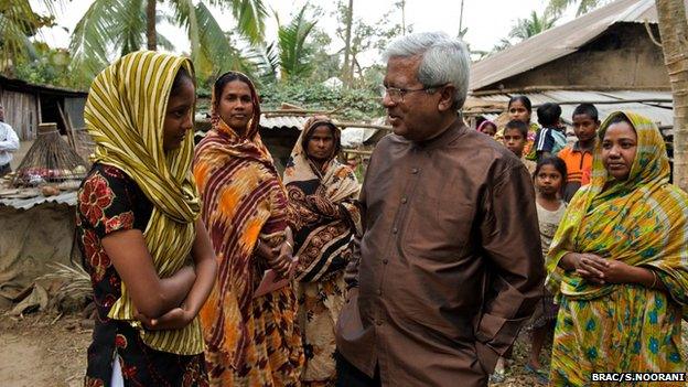 Sir Fazle talking to villagers (Image: BRAC/Shehzad Noorani)