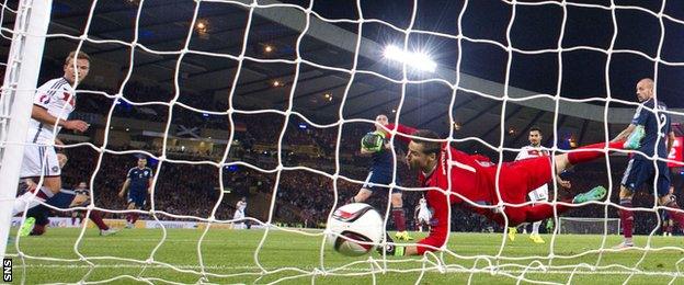 Scotland keeper David Marshall cannot stop Germany's Ilkay Gundogan from scoring