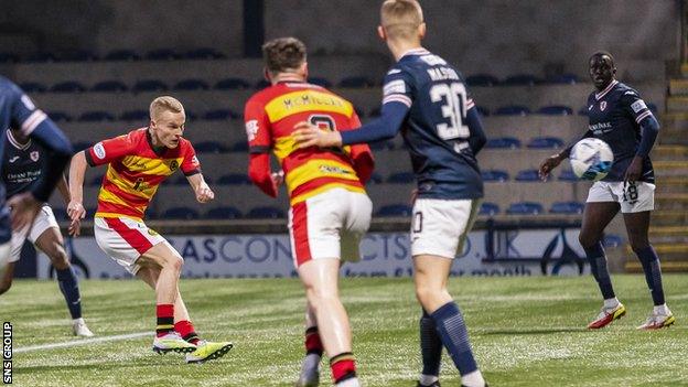 Partick's Scott Tiffoney scores to make it 2-2 during a cinch Championship match between Raith Rovers and Partick Thistle at Starks Park