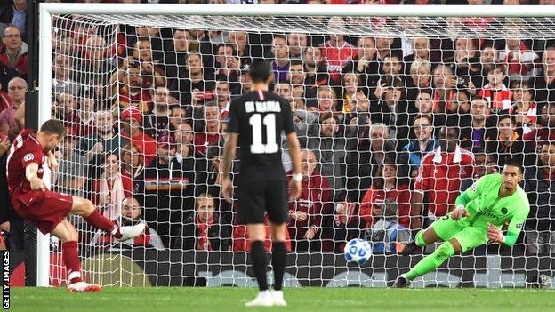 James Milner scores for Liverpool from the penalty spot gainst Paris St-Germain