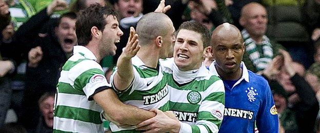 Scott Brown celebrates his goal at Ibrox in 2011