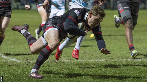 Edinburgh scrum-half Nathan Fowles streaks away to score their second try