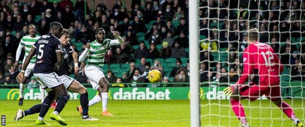 Odsonne Edouard watches his shot fly wide of the Dundee goal