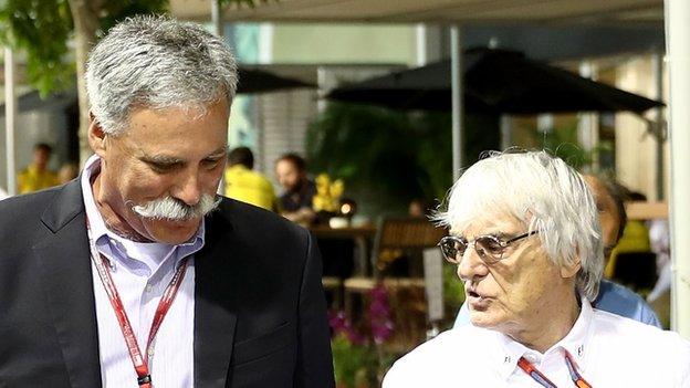 Chase Carey and Bernie Ecclestone