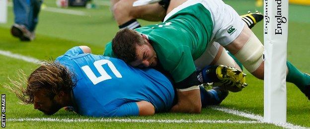 Josh Furno of Italy is tackled by Peter O'Mahony of Ireland to deny a try during the 2015 Rugby World Cup