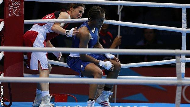 Katie Taylor consoles Natasha Jonas in the Olympics