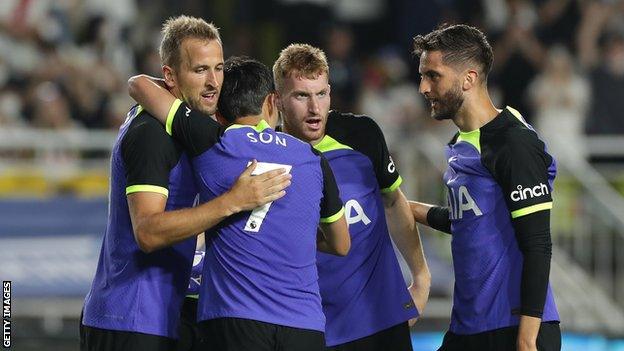 Spurs celebrate scoring against Sevilla