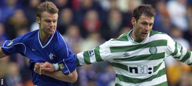 Arthur Numan in action for Rangers against Celtic's Chris Sutton