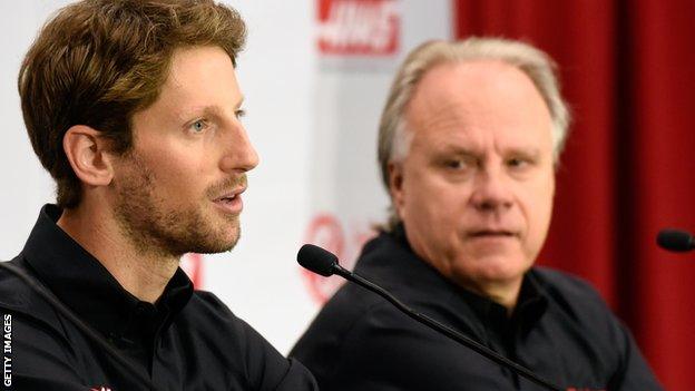 Romain Grosjean (left) with Gene Haas