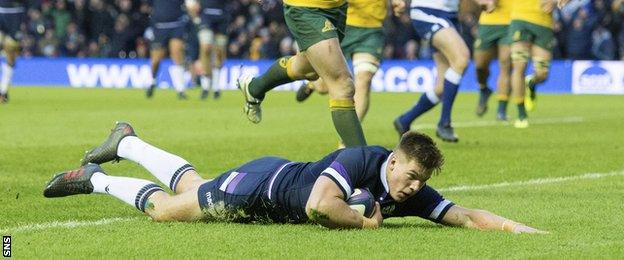 Huw Jones scores for Scotland against Australia