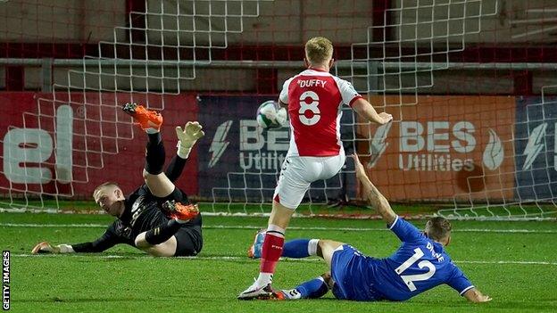 Mark Duffy scores for Fleetwood against Everton