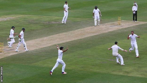 England celebrate a wicket