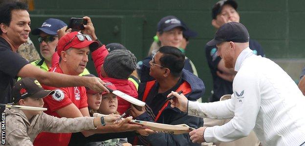 Ben Stokes signs autographs for supporters