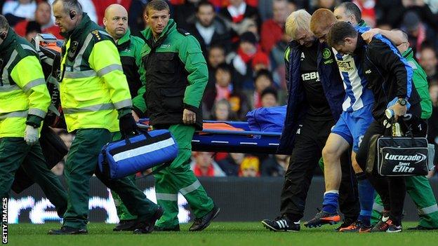 Wigan's Ben Watson after breaking his leg against Liverpool