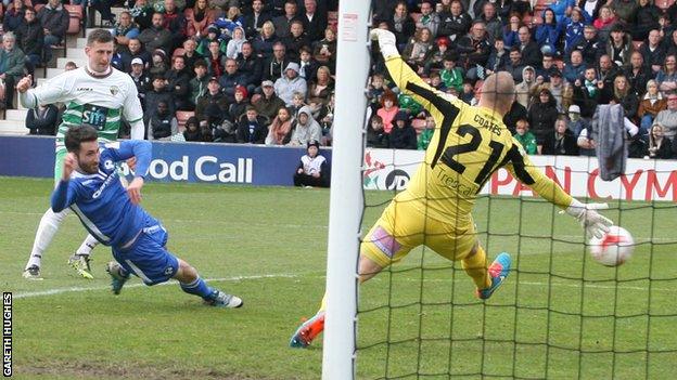 Scott Quigley scores New Saints' second goal against Airbus UK