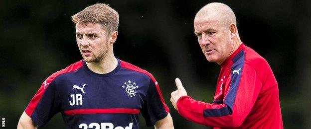 Jordan Rossiter and Mark Warburton during Rangers training