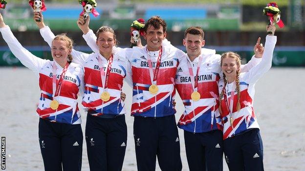 Ellen Buttrick, Giedre Rakauskaite, James Fox, Oliver Stanhope and Erin Kennedy celebrate their Tokyo gold medal succcess