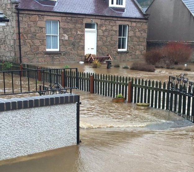 A couple of front gardens looking more like a river