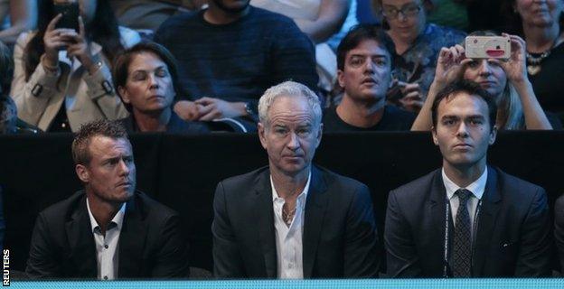 Australia's Lleyton Hewitt, John McEnroe and Great Britain's Ross Hutchins watch Andy Murray in action against Rafael Nadal