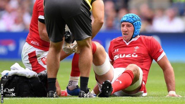 Justin Tipuric receives treatment at Twickenham