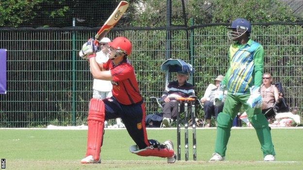 Ben Stevens hits a six against Tanzania