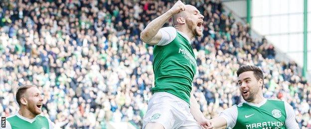 Hibernian skipper David Gray celebrates scoring against Queen of the South