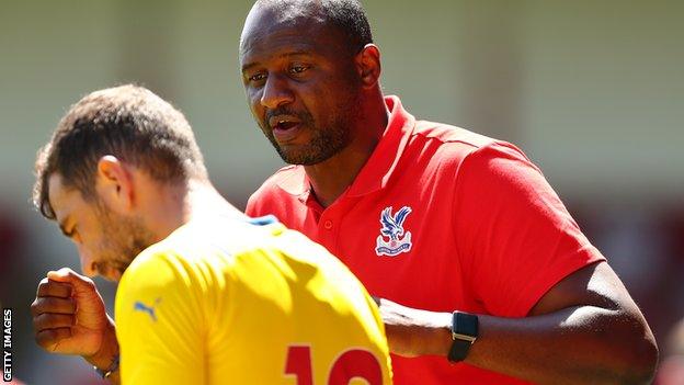 Vieira with experienced midfielder James McArthur during the friendly against Walsall