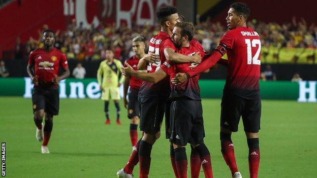 Juan Mata celebrates after scoring in pre-season