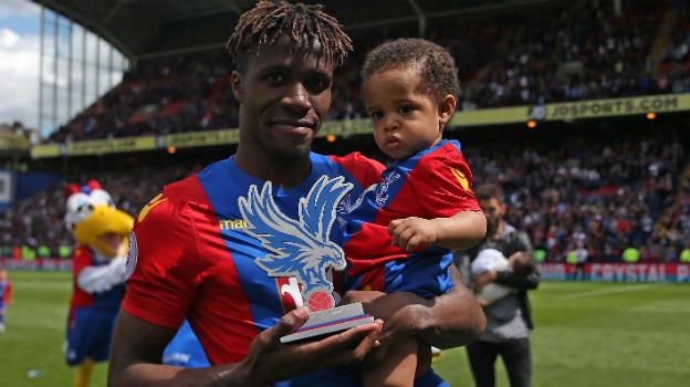 Crystal Palace forward Wilfried Zaha and his son Leo