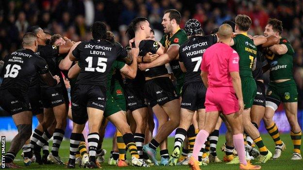 New Zealand and Australia players confront each other