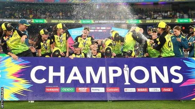 Australia celebrate with the Women's T20 World Cup trophy