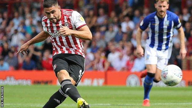 Brentford striker Neal Maupay scores against Sheffield Wednesday