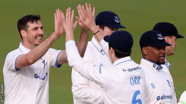 Steven Finn celebrates a wicket