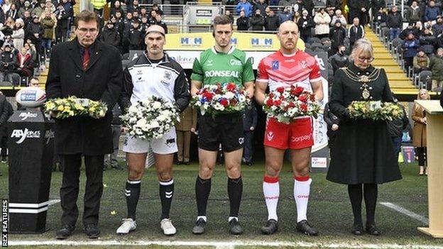 Rival captains Danny Houghton and James Roby and referee Chris Kendall were involved in the fitting pre-match tribute to Hull FC legend Johnny Whiteley