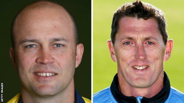 Warwickshire batsman Jonathan Trott (left) and Sussex coach Jon Lewis