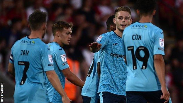 Exeter City players celebrate