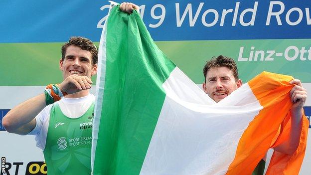 Philip Doyle (left) and Ronan Byrne celebrate their world championship silver medal